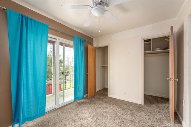 unfurnished bedroom featuring ceiling fan, access to exterior, a closet, and carpet flooring