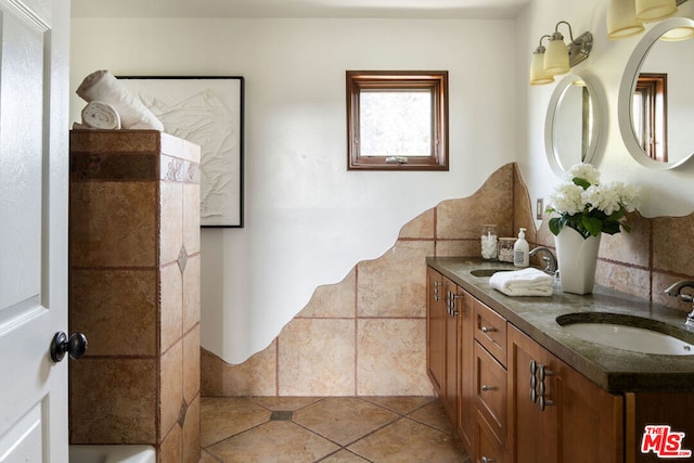 bathroom featuring tile patterned floors and vanity