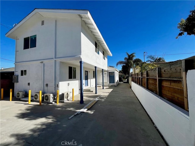 view of property exterior featuring ac unit