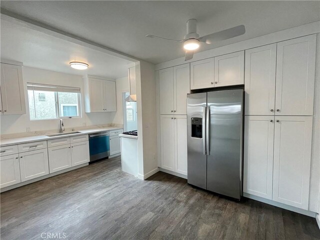 kitchen with dishwasher, white cabinetry, stainless steel fridge with ice dispenser, and sink