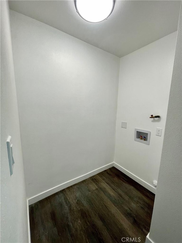 washroom with washer hookup and dark wood-type flooring