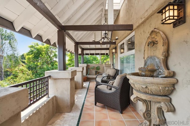 view of patio featuring ceiling fan