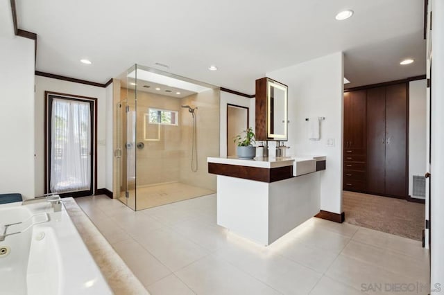 bathroom with vanity, tile patterned flooring, a shower with door, and ornamental molding