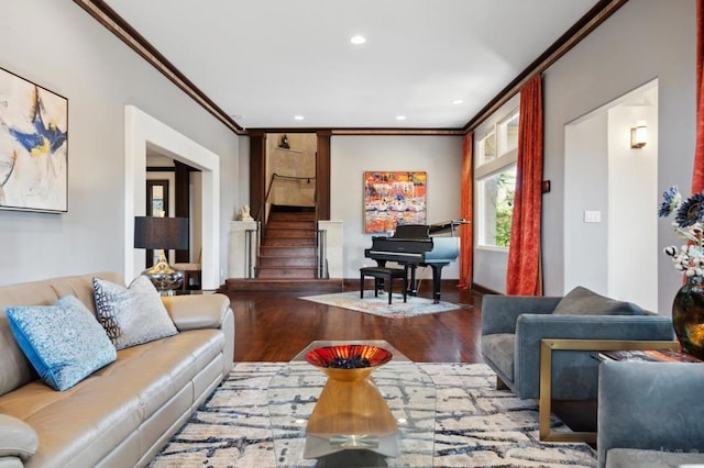 living room with hardwood / wood-style flooring and ornamental molding