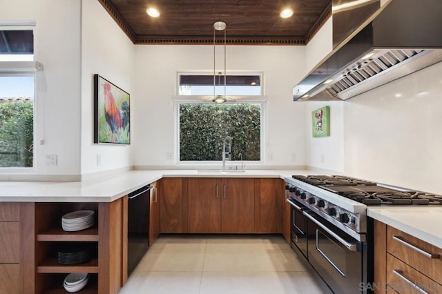 kitchen featuring double oven range, light tile patterned floors, ventilation hood, decorative light fixtures, and dishwasher