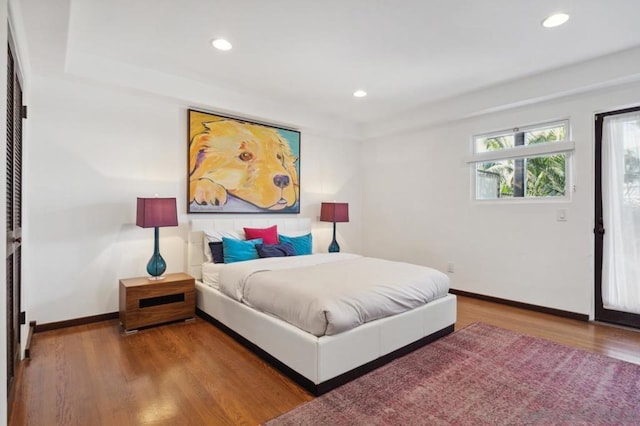 bedroom featuring hardwood / wood-style floors