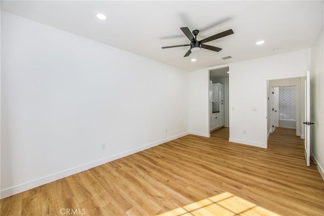 unfurnished bedroom featuring ceiling fan and light hardwood / wood-style floors