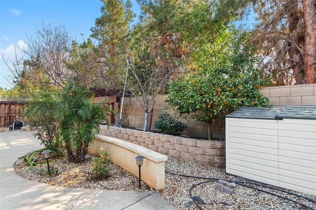 exterior space with a fenced backyard