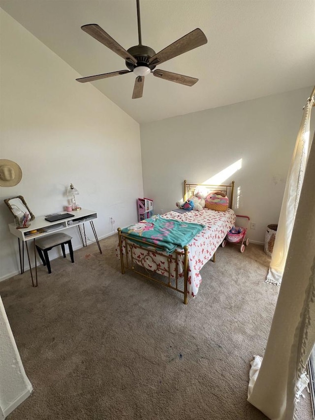 carpeted bedroom with vaulted ceiling and ceiling fan