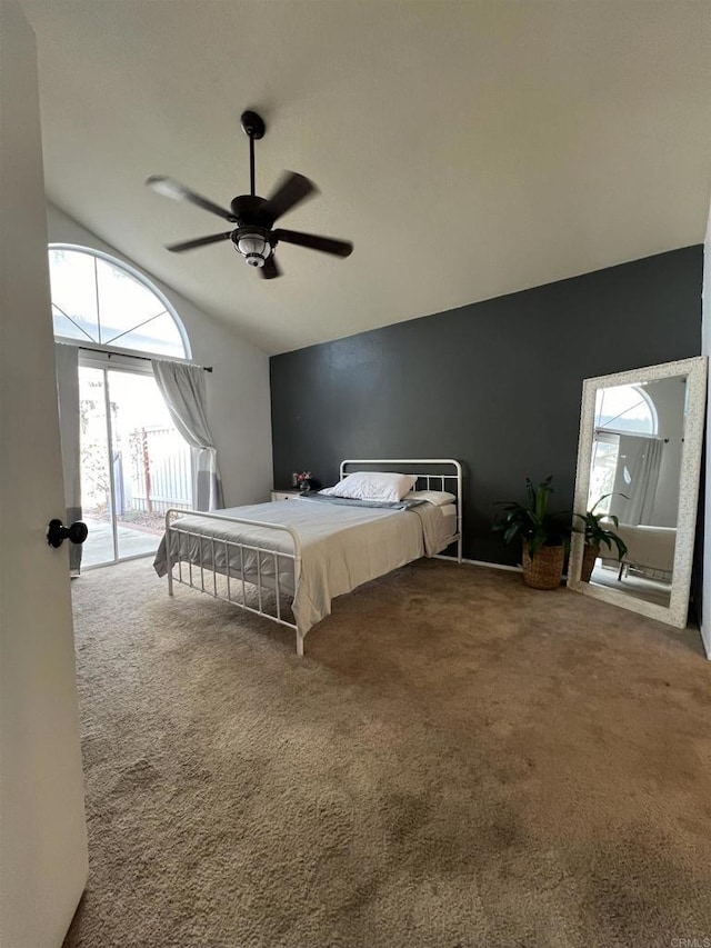 bedroom with ceiling fan, lofted ceiling, access to exterior, and carpet