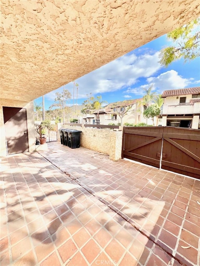 1 Cabrillo Dr, Avalon, CA 90704 - view of patio with a gate and a residential view