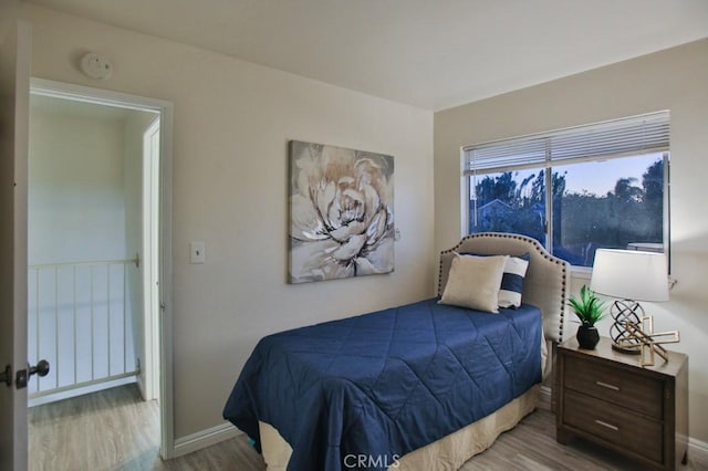 bedroom featuring hardwood / wood-style floors