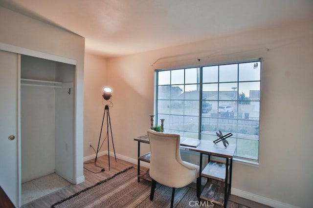 home office featuring hardwood / wood-style floors