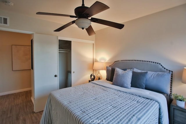 bedroom featuring ceiling fan and hardwood / wood-style floors