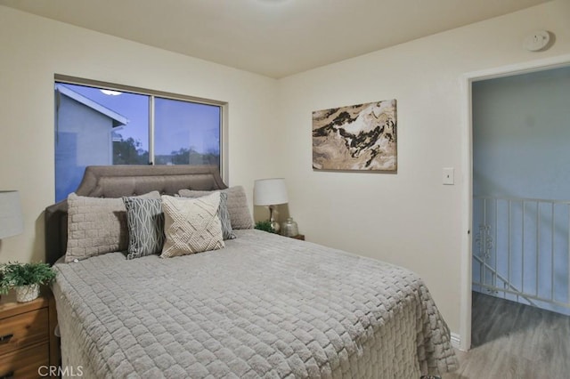 bedroom with wood-type flooring