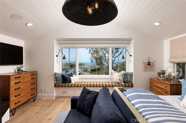 bedroom featuring wooden ceiling, lofted ceiling, and light wood-type flooring