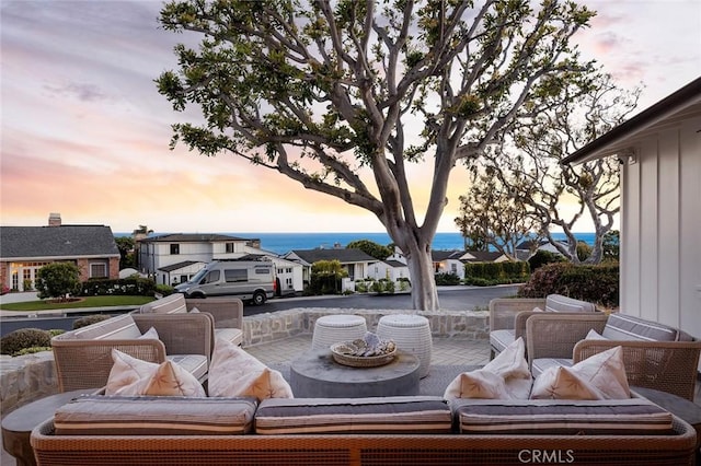 view of patio terrace at dusk