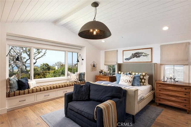 bedroom with light hardwood / wood-style floors, wooden ceiling, and lofted ceiling with beams