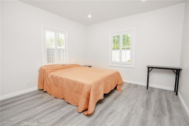 bedroom featuring light hardwood / wood-style flooring