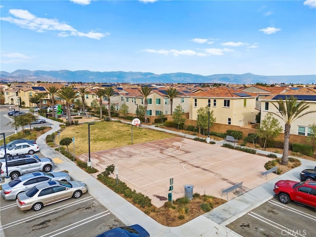 birds eye view of property with a mountain view