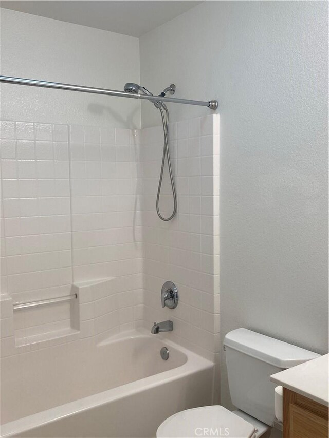 full bathroom with toilet, vanity, and shower / bath combination