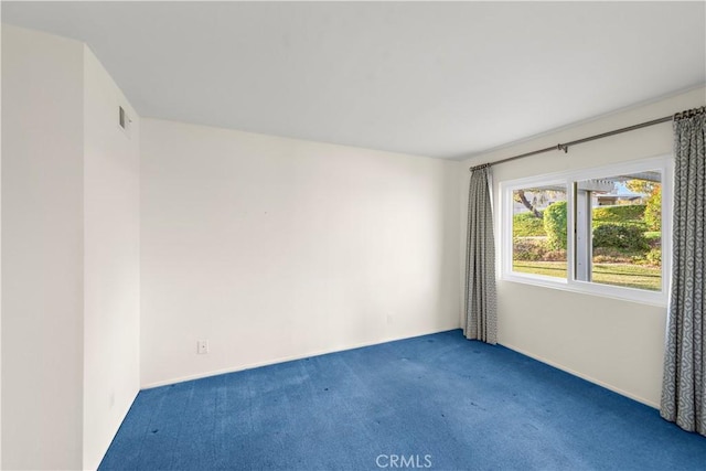 unfurnished room with carpet flooring