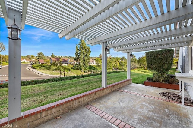 view of patio featuring a pergola