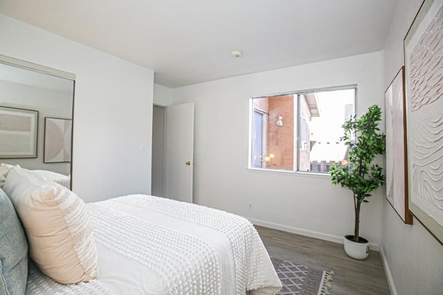 bedroom featuring wood-type flooring