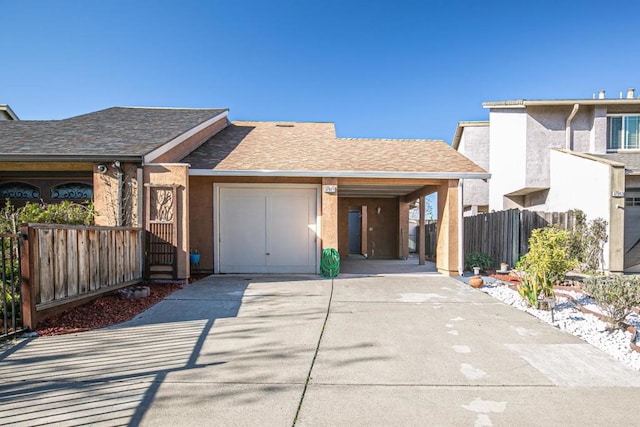 view of front of property featuring a garage