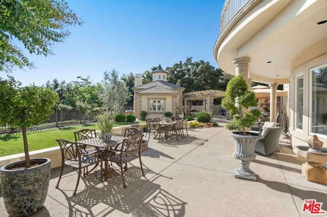 view of patio / terrace featuring a pergola