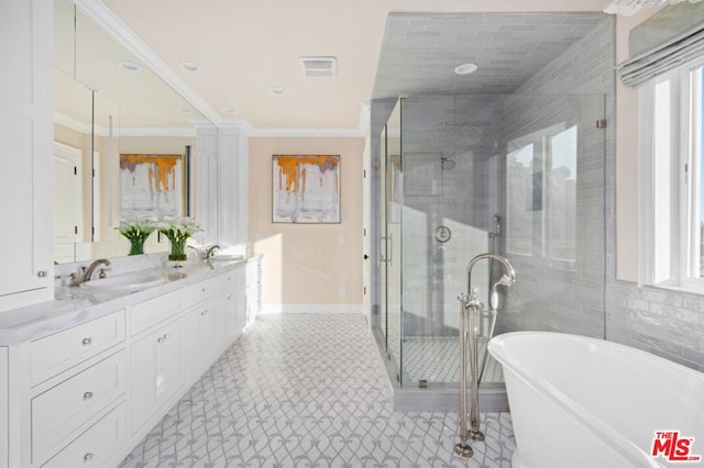 bathroom featuring plus walk in shower, ornamental molding, and vanity