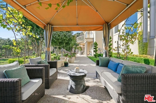 view of patio / terrace with an outdoor hangout area and a gazebo