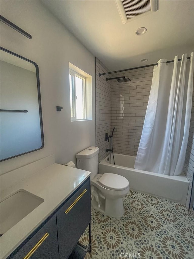 bathroom with toilet, shower / bath combination with curtain, vanity, and visible vents