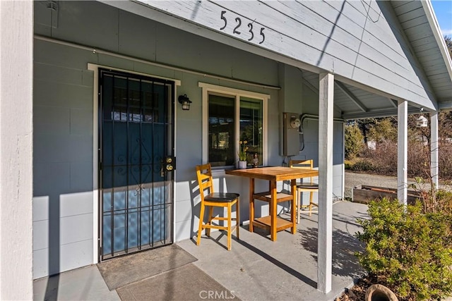 entrance to property featuring a patio area