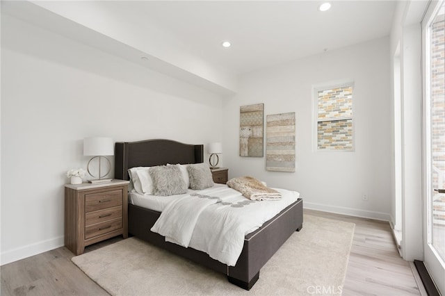 bedroom featuring light hardwood / wood-style floors