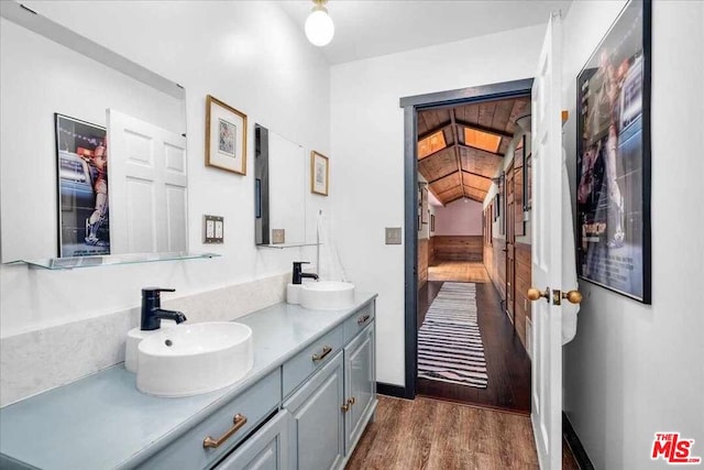 bathroom featuring vanity and hardwood / wood-style flooring