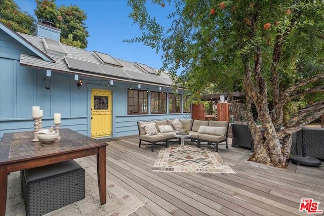 deck with an outdoor living space