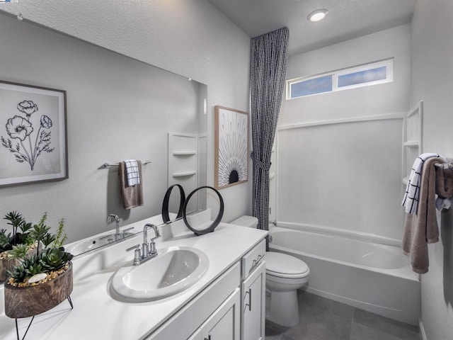 full bathroom featuring tile patterned floors, shower / bath combination, toilet, and vanity