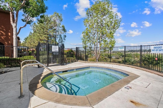 view of pool featuring a community hot tub