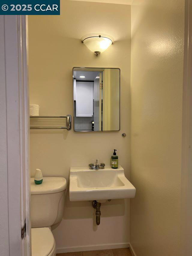 bathroom with sink and toilet