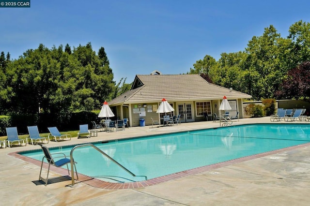 view of pool featuring a patio area