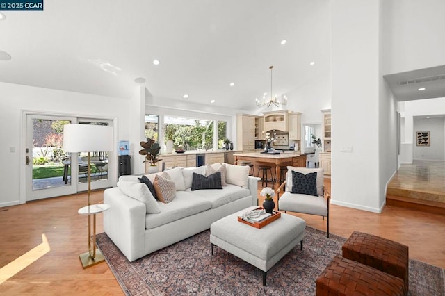 living room with a notable chandelier