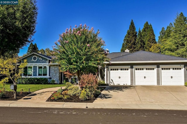 ranch-style house featuring a garage