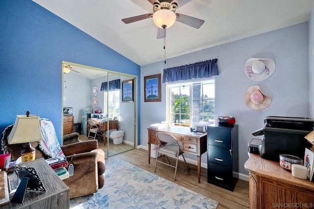 office area with lofted ceiling, light hardwood / wood-style floors, and ceiling fan