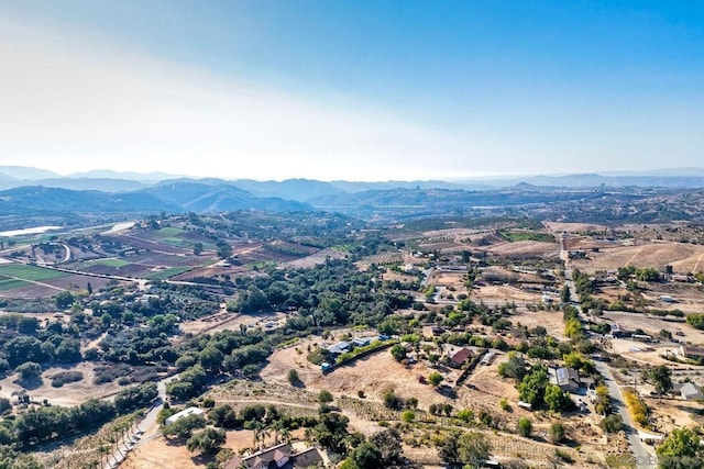 drone / aerial view featuring a mountain view