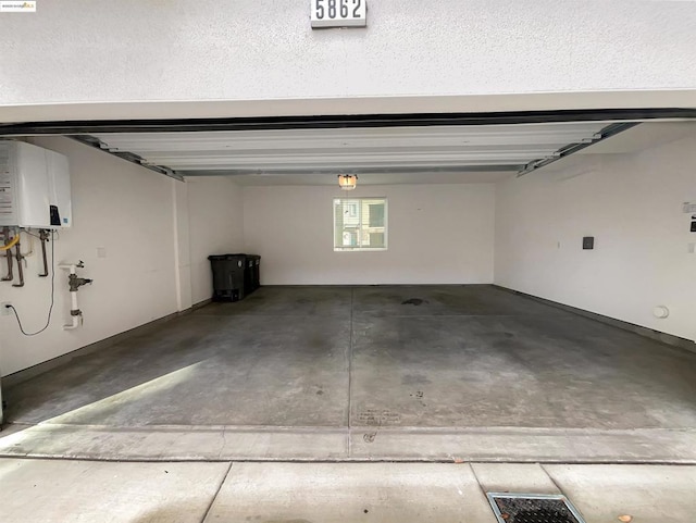 garage featuring water heater