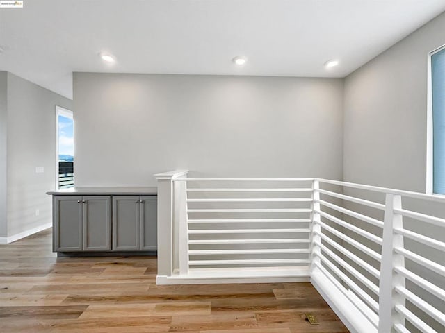 hallway with light wood-type flooring