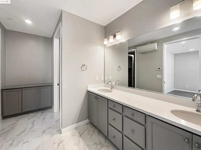 bathroom with vanity and a wall mounted air conditioner