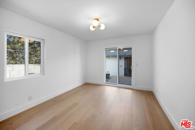 empty room with light wood-type flooring