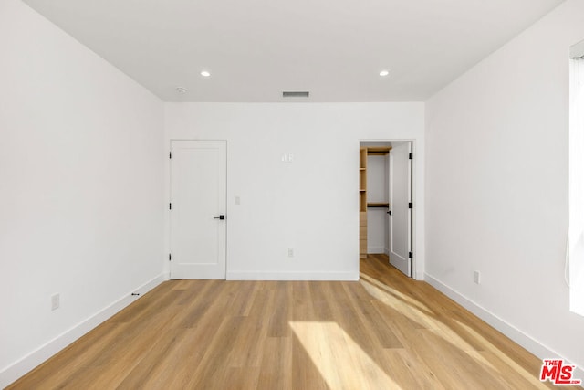 empty room featuring light hardwood / wood-style floors